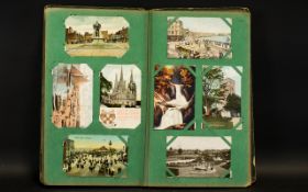 Antique Postcard Album Containing a quantity of early 20th century cards.