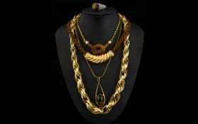 A Mixed Collection Of Gold Tone Costume Jewellery Five items in total to include silver tone