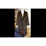 Mink Coat Dark Brown from Fletcher of Southport. Fully lined in brown polysilk fabric.
