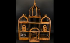 Reproduction Victorian Style Birdcage Varnished wood elaborate birdcage. height, 29 inches.