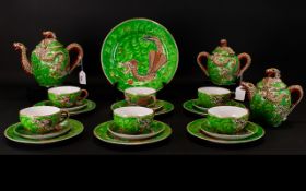 Oriental Dragon Design Tea Service Early 20th century sixteen piece set comprising six cups and