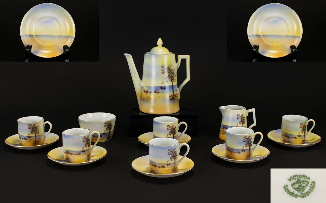 Victoria China (Czech) 15 Piece Coffee Set with hand painted scenes to each cup and saucer. Circa