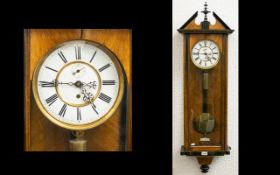 A Late 19th Century Vienna Wall Clock Single weight with white chapter dial,