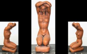 A Contemporary Terracotta Figure Small figure in the form of a kneeling female nude,