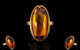 Russian Nice Quality and Attractive Cabochon Cut Amber Set Ring. Set in 14ct Gold.