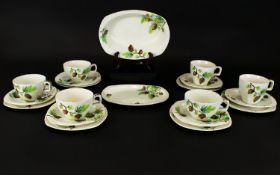 Midwinter Acorn Pattern 20 Assorted Pieces Circa 1950s. Includes 5 saucers, 4 teacups (slight chip