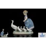 Lladro Porcelain Figure ' Hurry Now ' Model No 5503, Issued 1988 - 2004. 7.5 Inches - 18.75 cm High.