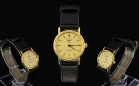 Longines Quartz Ladies Nice Quality 9ct Gold cased Wrist watch - with attached leather strap.