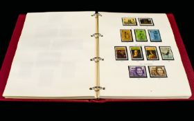 Conventional Stanley Gibbons Stamp Album containing stamps from Victorian times to 1982, Noted 36