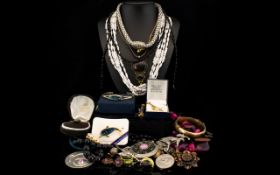 A Mixed Collection Of Costume Jewellery A varied lot to include various necklaces, beads,