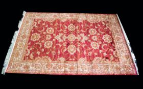 A Very Large Woven Silk Carpet Large Zeigler carpet, red ground with repeated red floral and foliate