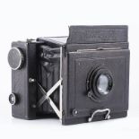 Zeiss Ikon Microflex folding camera, fitted with Carl Zeiss Jena f= 150mm lens, in leather carry