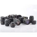 Chinon SLR 35mm film cameras CE5 and CE4s along with a number of lenses, flash and accessories, in