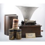 Edison oak case phonograph, with trumpet, and a collection of cylinders.