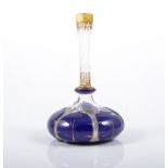Victorian blue overlaid glass scent bottle, compressed form, gilt painted, 17cm.