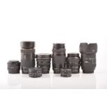 Collection of SLR camera lenses, including Canon zoom lens EF 20-35mm 1:3.5 to 4.5, Canon 28-105mm