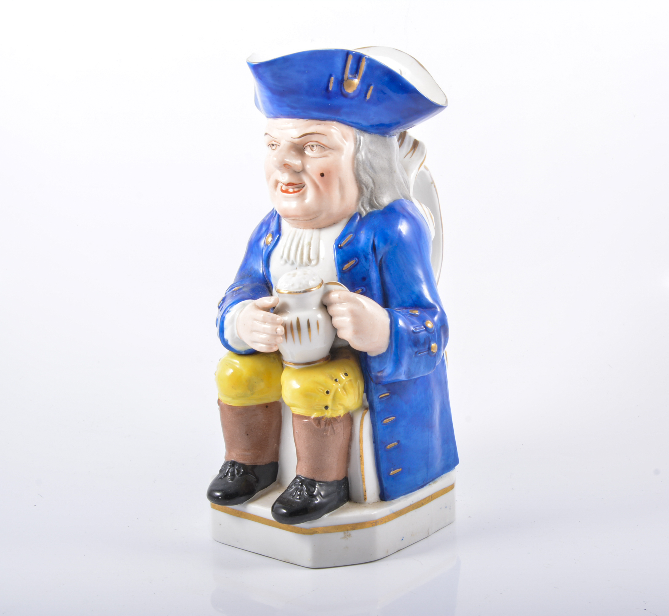 Staffordshire porcelaneous Toby Jug, late 19th Century, Mr Toby seated holding a foaming jug of ale, - Image 2 of 2