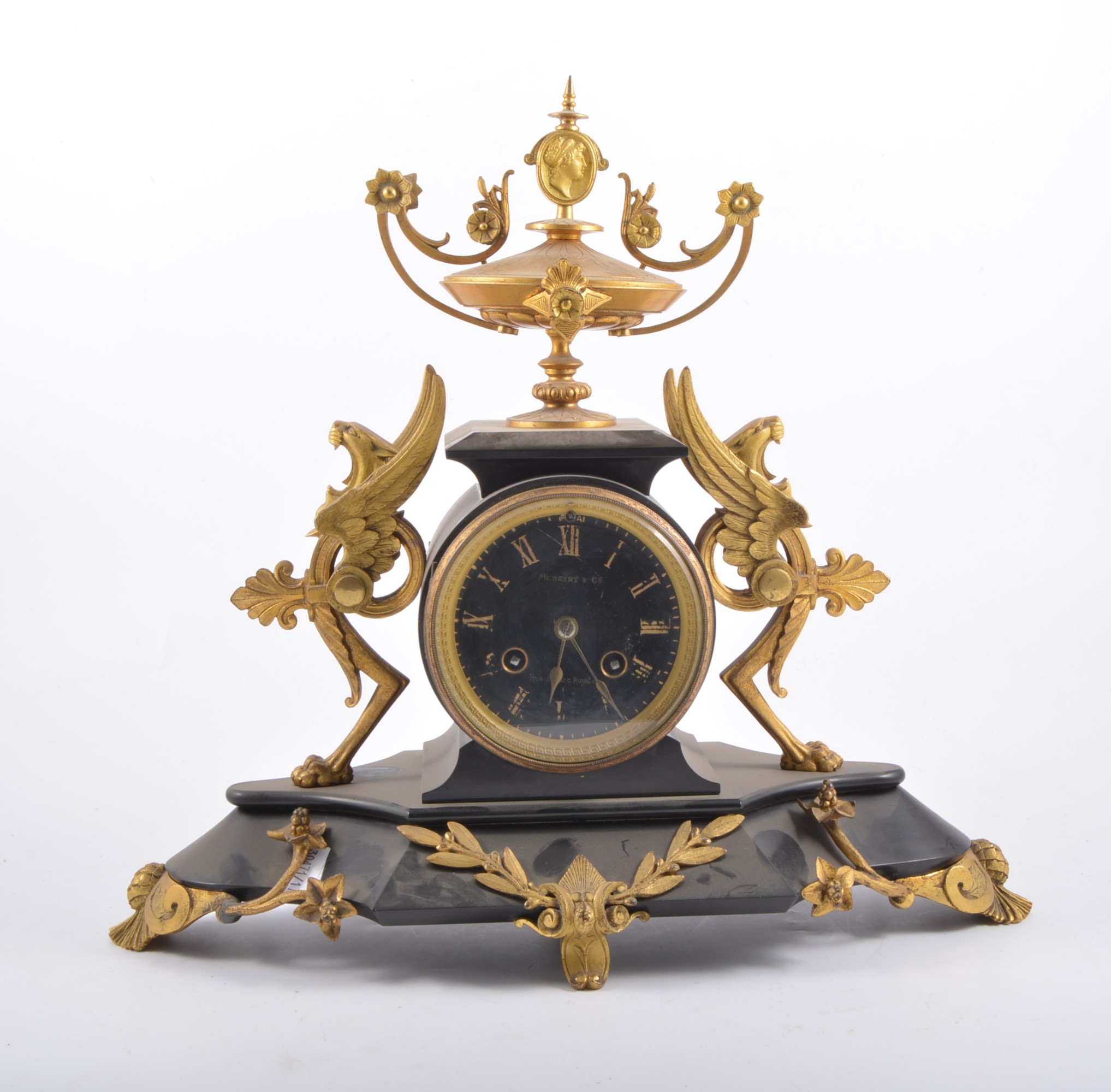 A French Empire style marble and ormulu mantel clock, late 19th century, signed Mercery & Co,