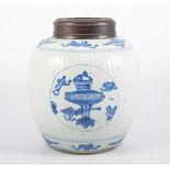 Two blue and white ginger jars, one of a prunus design with cover,