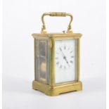 French brass cased repeater carriage clock, rectangular enamelled dial, movement striking on a gong,