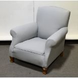 Edwardian armchair, cotton covers, scrolled arms, oak tapering legs, width 91cm.