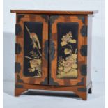 Japanese parquetry and lacquered table cabinet, width 35cm.