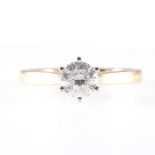 A diamond solitaire ring,