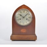 Edwardian lancet-shape mantel clock, inlaid mahogany case with a fan oval, silvered dial,