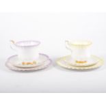 Royal Albert tea/coffee sets in the "Rainbow" design, twelve cups and saucers to each set,
