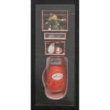 Boxing interest: a boxing glove signed by Marco Antonio Barrerra at the Sheffield Hilton Hotel at