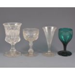 Twelve various Victorian green tinted wines and other drinking glass.