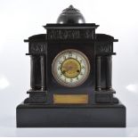 Victorian black slate mantel clock, architectural pediment, with a classical frieze, circular dial,