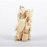 A carved ivory okimono, of a merchant with baskets, 9.5cm high.