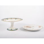 Two French dessert services with tazzas and plates, one with a blue floral design by GDA,