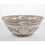 Large Cantonese polychrome rose bowl, decorated with dragons chasing flaming pearls, diameter 41cm.
