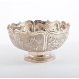 Chinese silver bowl, embossed decoration of bamboo and prunus, 13cm diameter.