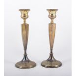 A pair of silver filled candlesticks, 28cm high, Birmingham 1945,