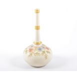 Grainger & Co bottle vase, floral decoration on an ivory ground, 15cm.