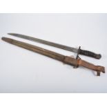 US Remington bayonet, stamped 1917, in leather scabbard, bayonet 57cm.