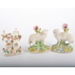Pair of Staffordshire spill vases modelled as sheep, 15cm, and four cottages, (6).