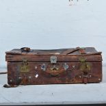 Vintage leather suitcase, brass lock furniture, 80cm wide.