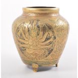 A Chinese brass vessel with three panels depicting a warrior and Cundi style figure with floral