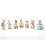 Seven Beswick Beatrix Potter figures, "Timmy Tiptoes", "Samuel Whiskers", "Aunt Pettitoes",