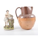 Staffordshire group, Shepherd Boy, 50cm; and three graduating Stoneware jugs,