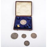 Small collection of coins, including a Victoria silver crown, George II quarter guinea,