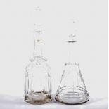 Two cut glass decanters, one mallet shaped 35cm high,