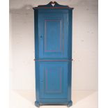 Early 20th Century painted pine corner cupboard, with panelled doors, D52cm x H106cm.