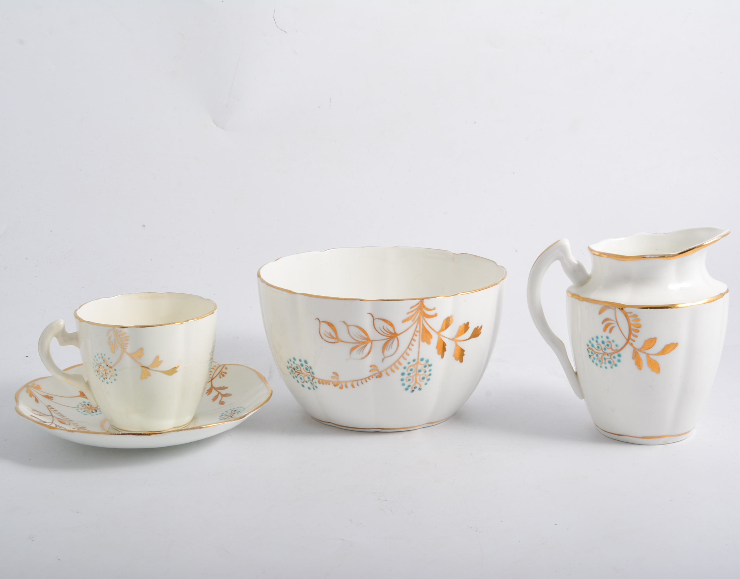 Late 19th century Staffordshire tea service, gilt and turquoise flower design,