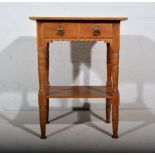 An oak side table, rectangular top, two frieze drawers, turned and ringed legs 57.5 x 43 x 76cm.