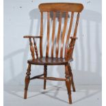 Beech and elm fireside armchair, vertical splats, turned supports, height 117cm.